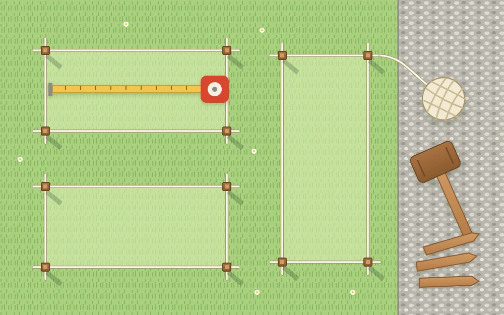 Top view of a yard with string lines and corner stakes marking three future bed rectangles on the lawn